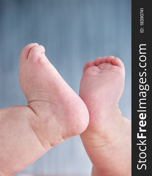 Baby feet. Four months old baby girl. Clipping path included.