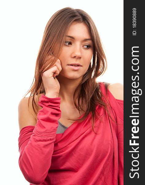 Pretty young woman talking on new cellular mobile phone, holding and listening close to ear isolated on a white background