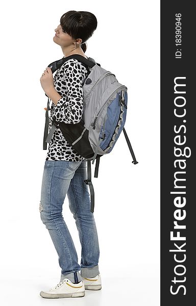 Young student with his backpack, the picture is done in studio, isolated on white. Young student with his backpack, the picture is done in studio, isolated on white