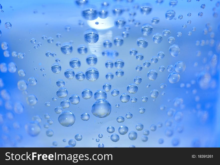 Underwater light and flowing bubbles, abstract background