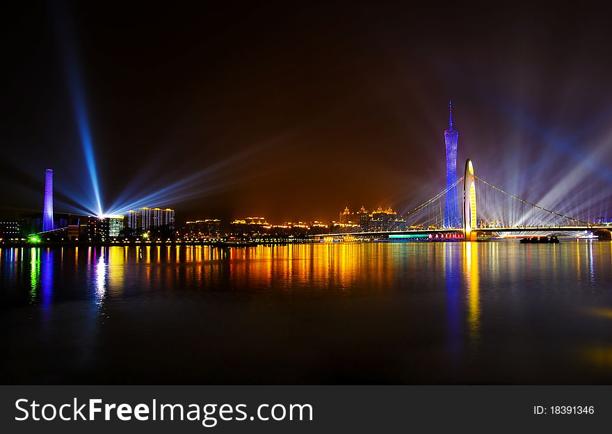 The night scenic of Liede Bridge in Guangzhou of China with colorful neon light over the Pearl River.