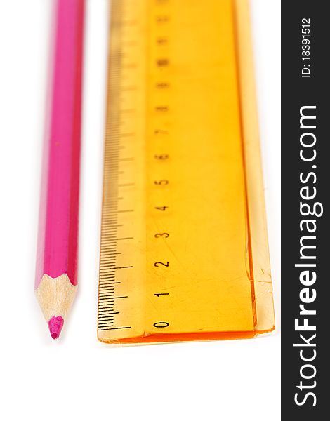 Red pencil and a yellow line isolated on a white background