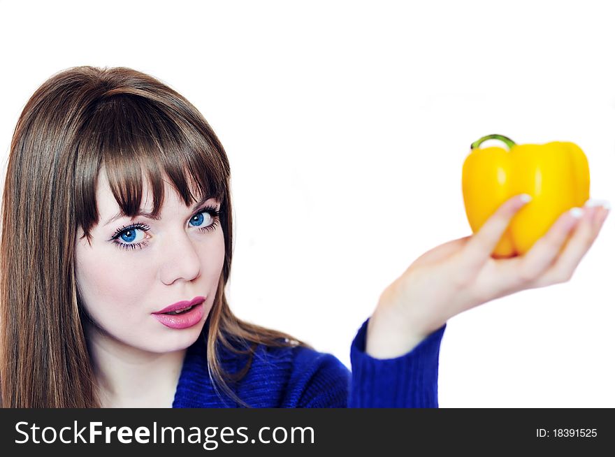Young woman with yellow paprika. Young woman with yellow paprika