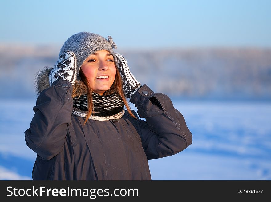 Portrait of a young beautiful girl in the cold. Portrait of a young beautiful girl in the cold