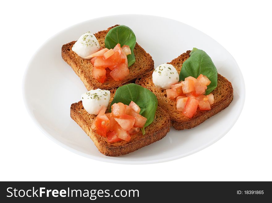 Toasts with mozzarella, basil and tomato. Toasts with mozzarella, basil and tomato