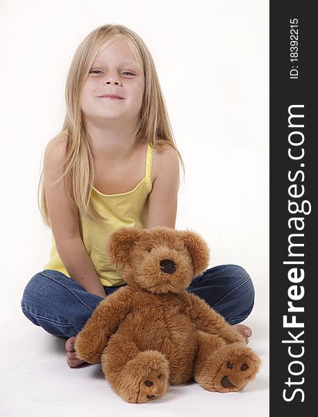 Little girl with a pleased expression, looking at camera. Little girl with a pleased expression, looking at camera.