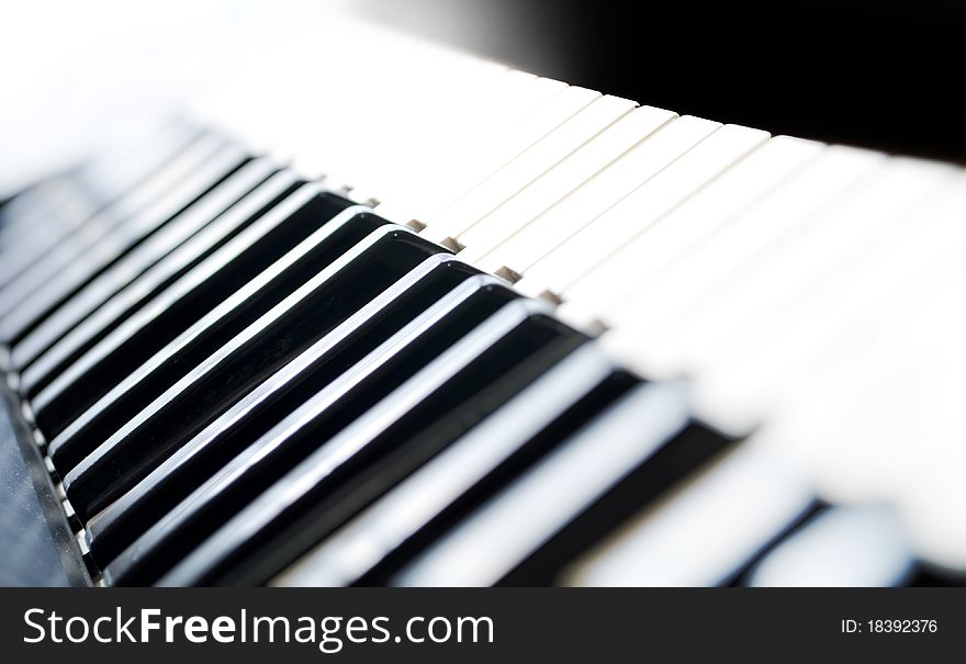 Piano keyboard, closeup of music instrument