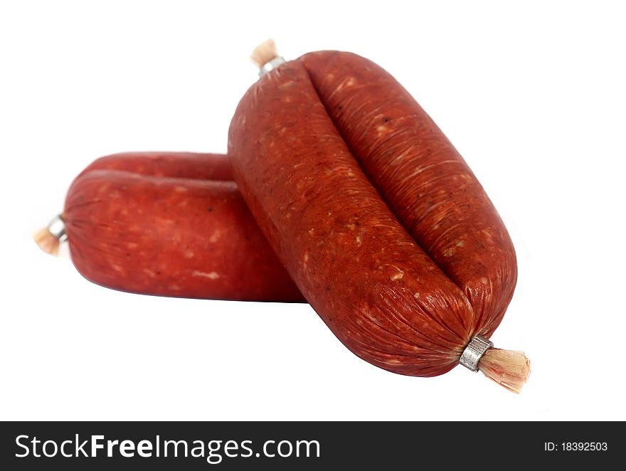 Sausages with red meat isolated on white background.