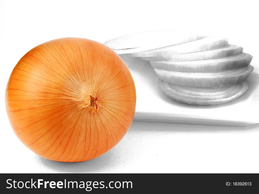 Isolated fresh onions on dish with black and white color