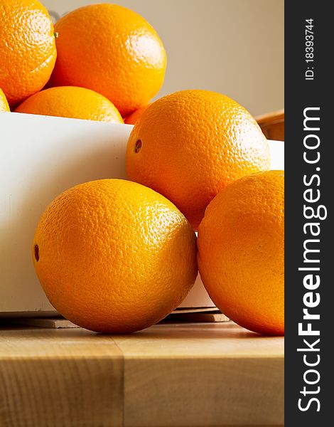 Fresh Oranges in a wooden box, Closeup, Format Filling