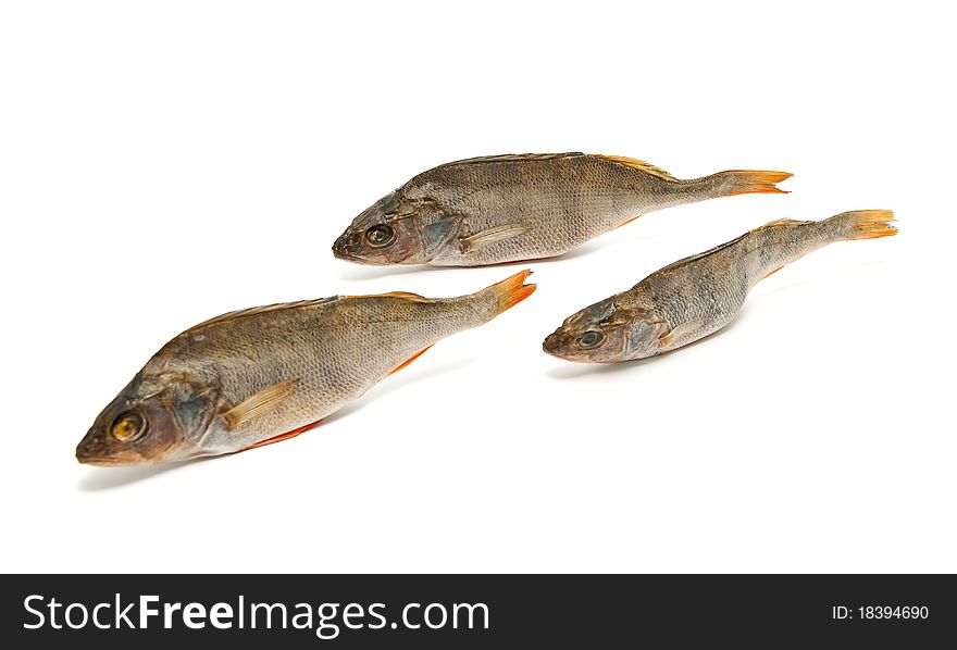 Three salted fish on a white background
