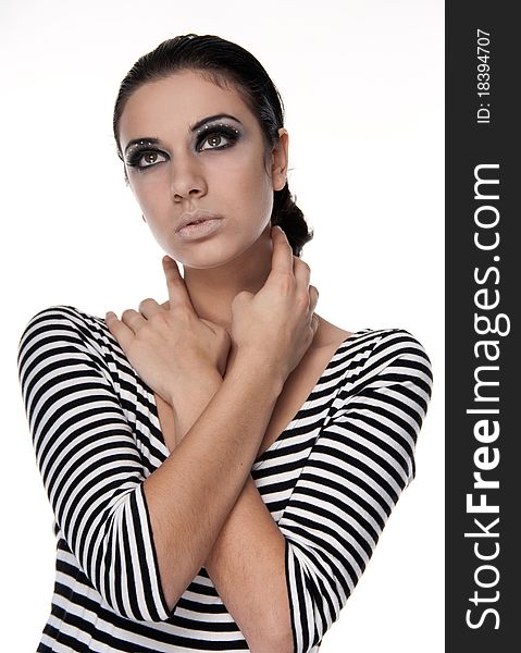 Studio shot of sensual young woman with bright make-up and black frame