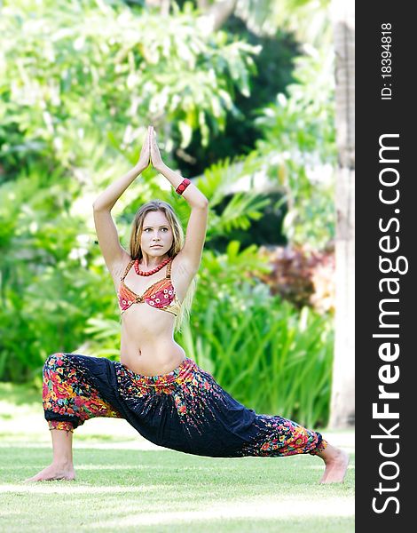 Young beautiful woman doing yoga on natural background. Young beautiful woman doing yoga on natural background