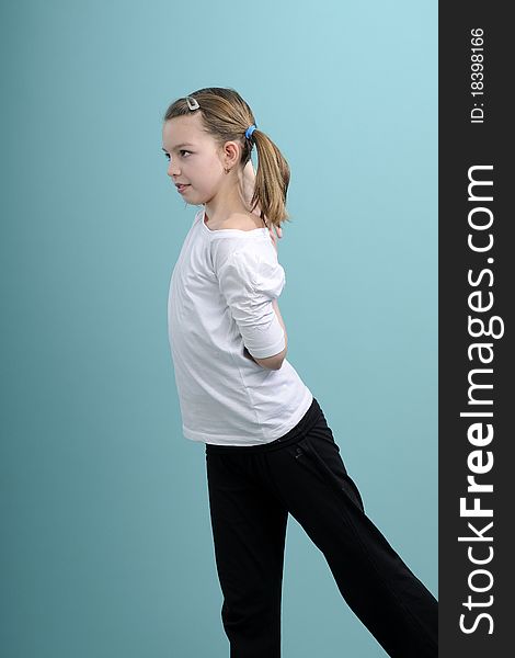 Active girl exercising in studio. Active girl exercising in studio