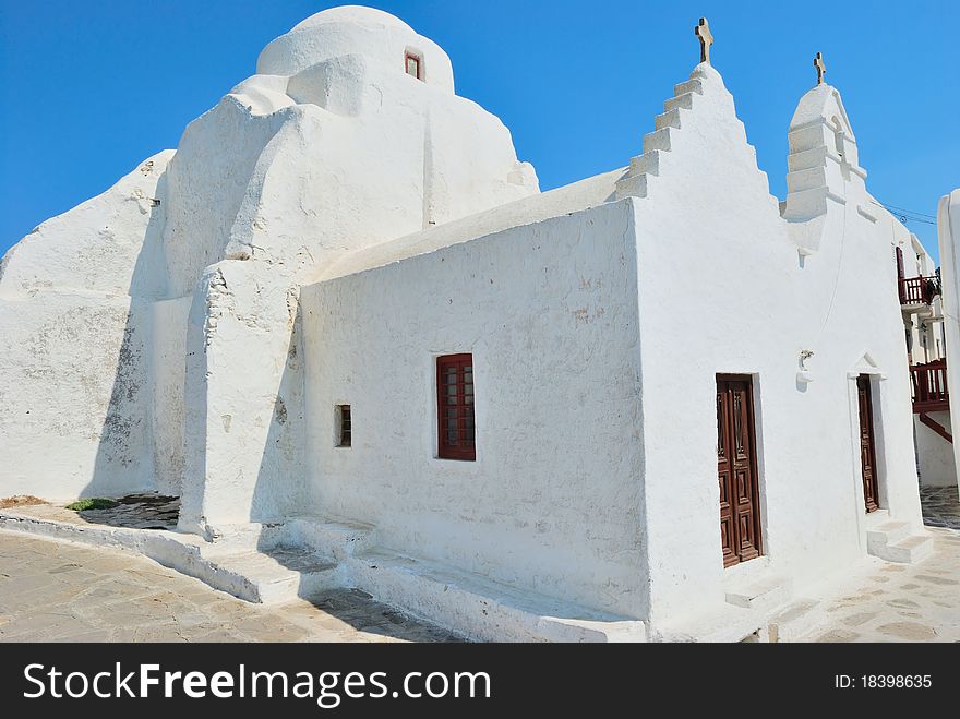 Mykonos white church with blue sky