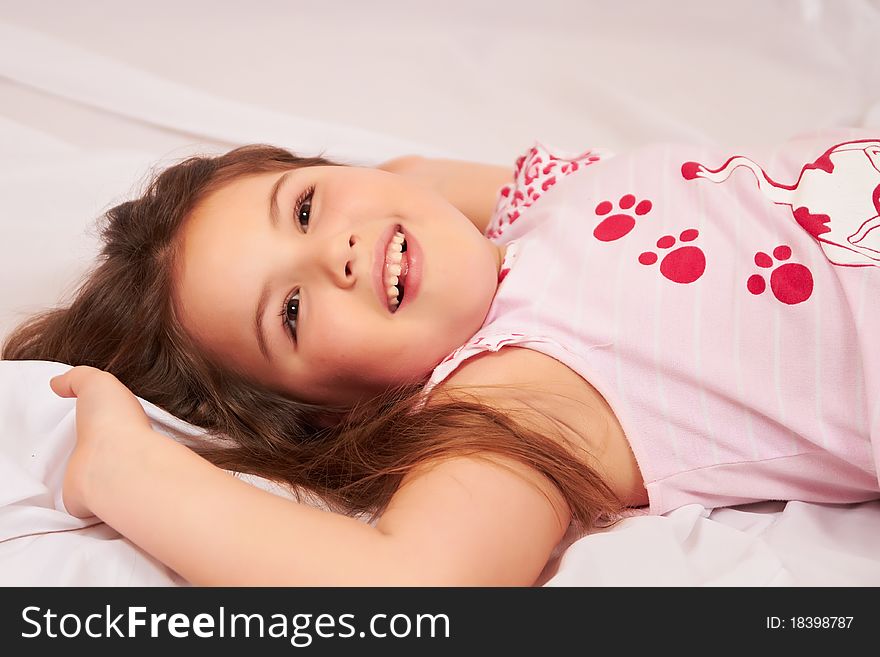 Girl Lying On The Floor And Have Fun.