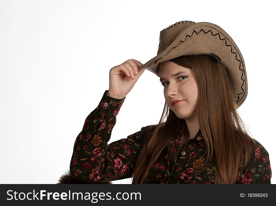 Attractive cowgirl portrait on white background