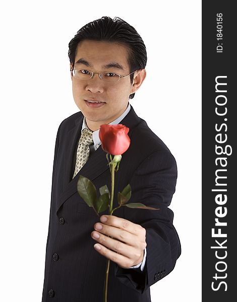 Asian young guy holding roses for proposing. Asian young guy holding roses for proposing.