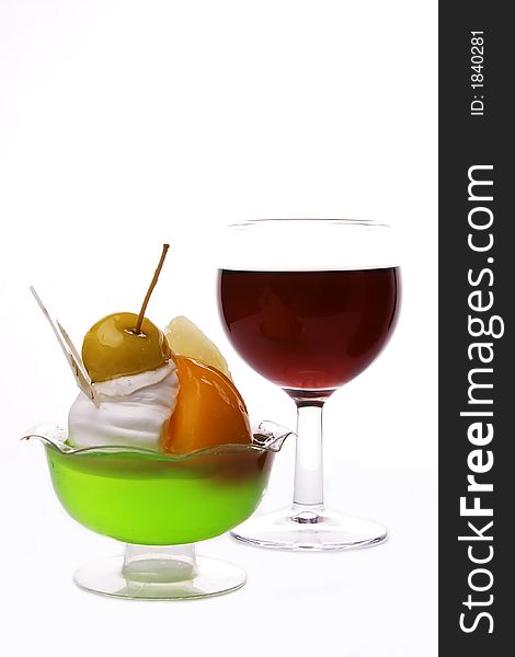 Red wine and delicious dessert in white background. Red wine and delicious dessert in white background.