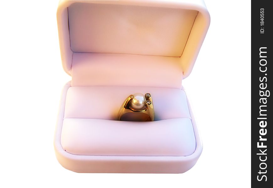Gold ring with pearl and diamonds in a pink box, over white