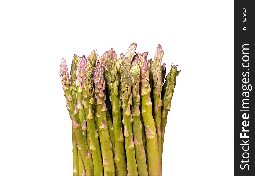 Macro view of a large bunch of green asparagus isolated on white background