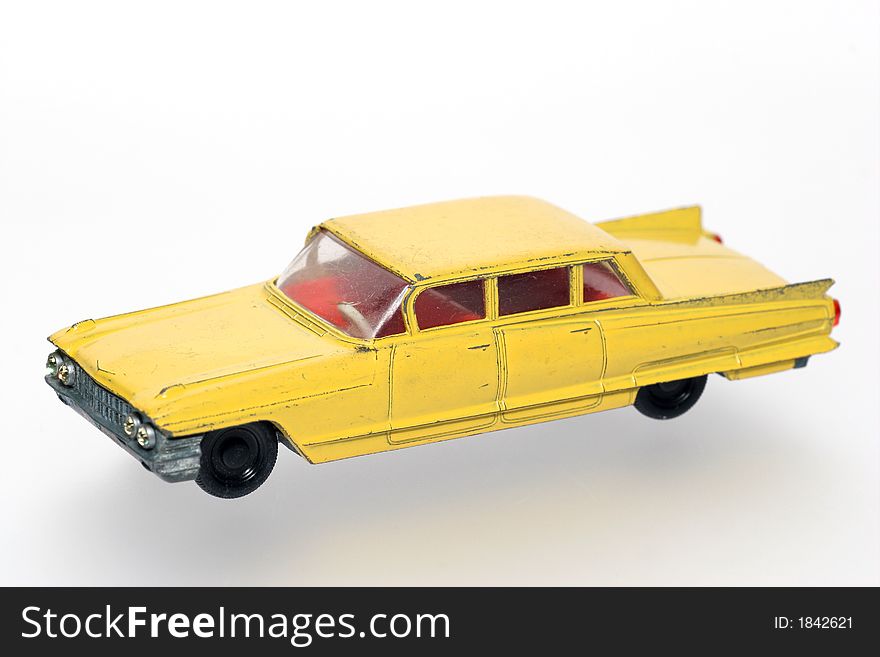 Old Abused Yellow Toy Cadillac