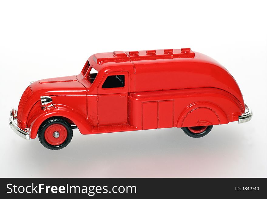 Strange red toy tank truck