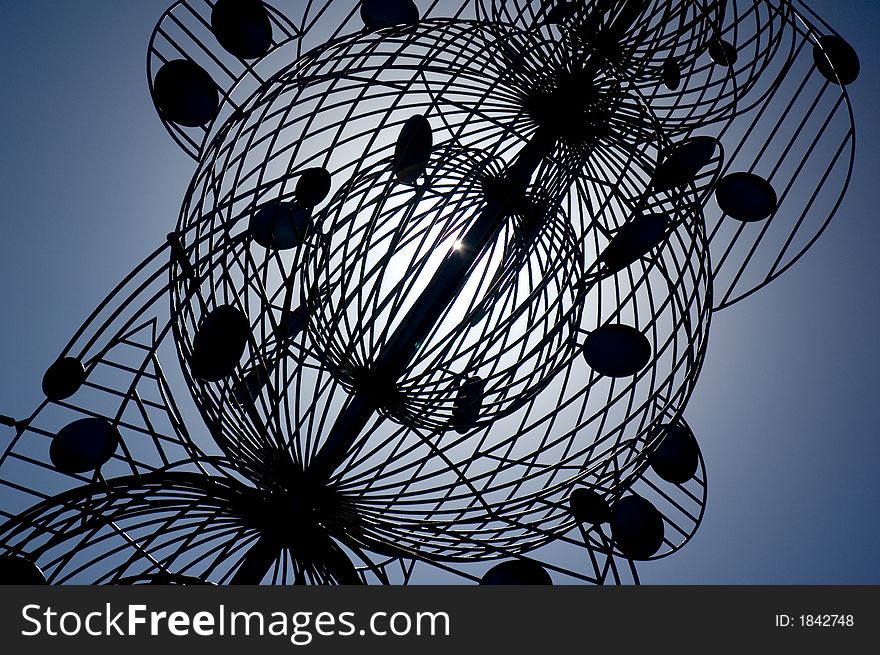 Metal statue in Lanzarote backlit to accentuate the design. Metal statue in Lanzarote backlit to accentuate the design