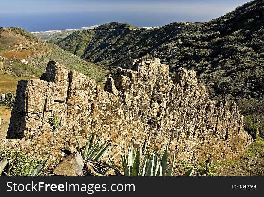 Broken wall at the Caldera de Los Marteles in the Cumbre in Gran Canaria. Broken wall at the Caldera de Los Marteles in the Cumbre in Gran Canaria