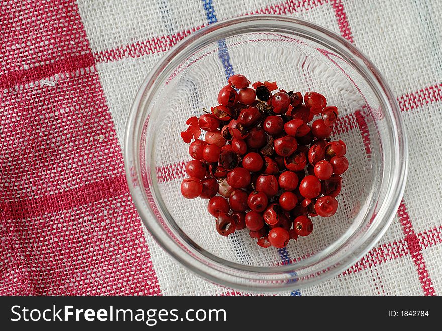 Closeup of glasscup with red berries