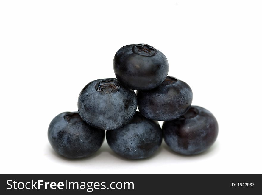 Blue berries isolated against a white background. Blue berries isolated against a white background