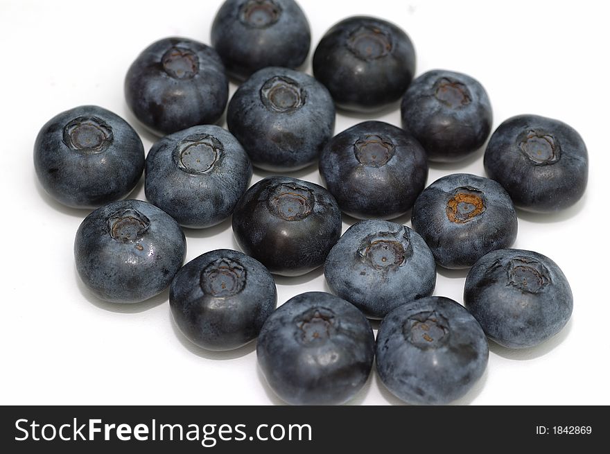 Blue berries isolated against a white background. Blue berries isolated against a white background