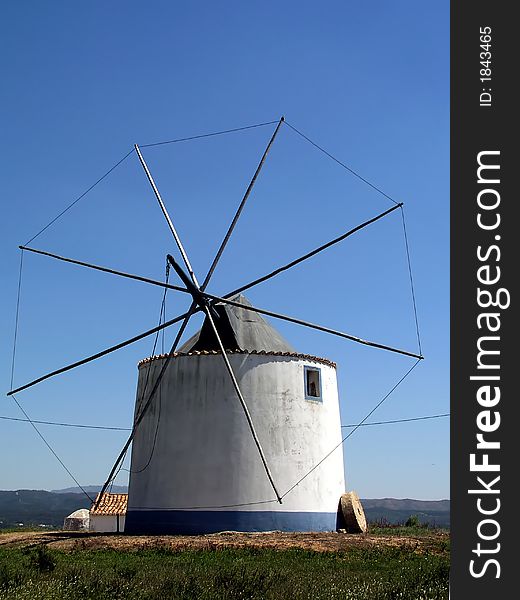 Ancient wind mill in Portugal. Ancient wind mill in Portugal