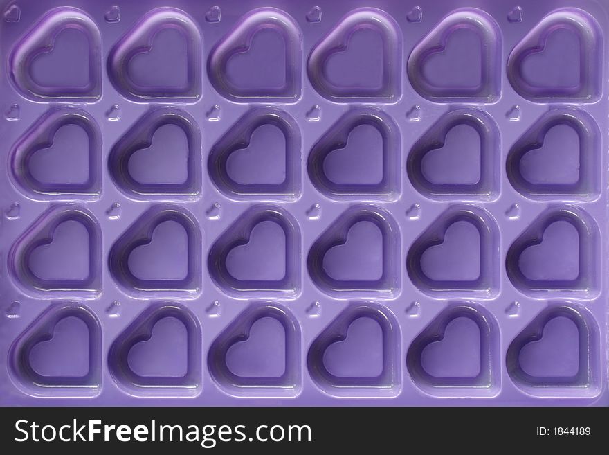 Violet hearts background - the symbol of love. Violet hearts background - the symbol of love