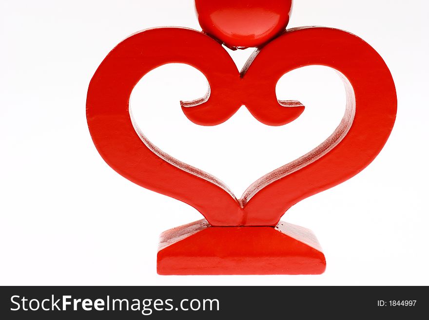 Red heart shape candlestick isolated on white background