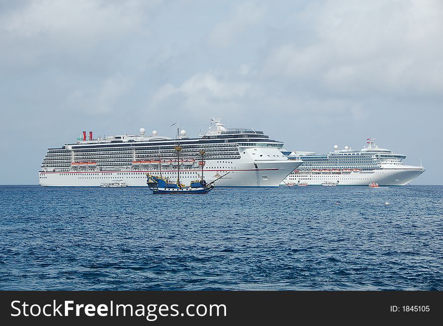 Pirate ship in front of modern ships