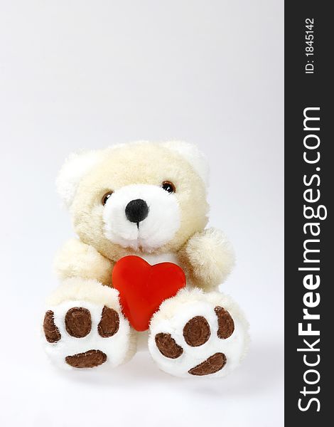 Teddy bear with red heart and space for text. Teddy bear with red heart and space for text