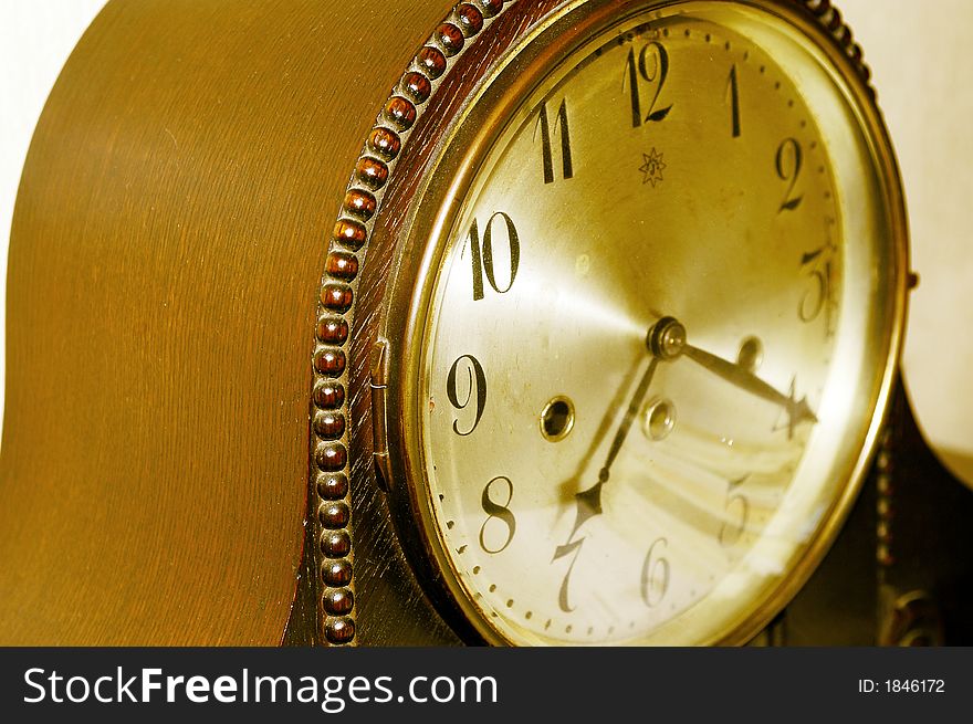 Old antique clock with sepia effect