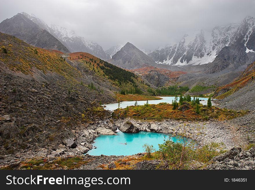 Turquoise Lake And Mountains.