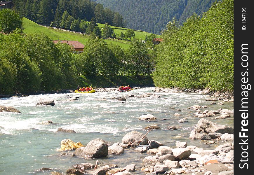 Whitewater rafting in a little yellow boat