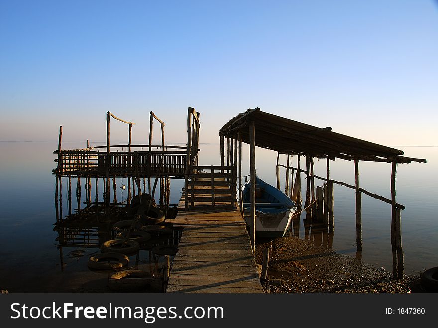 Tranquil scene with custom fishing boat anchorage