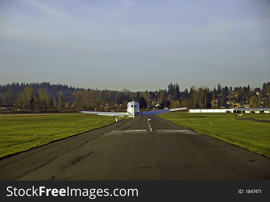 Small prop plane landing at Harvey Field in Snohomish, WA. Small prop plane landing at Harvey Field in Snohomish, WA