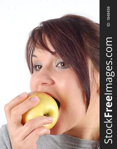Attractive woman eating apple on white background. Attractive woman eating apple on white background