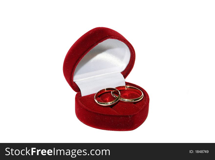 Gold wedding rings in a red casket. Gold wedding rings in a red casket