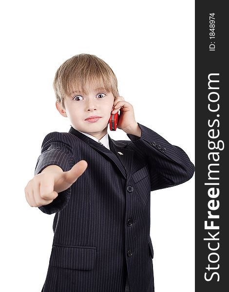 Close-up of boy in business suit. Shot in studio. Isolated with clipping path. Close-up of boy in business suit. Shot in studio. Isolated with clipping path.