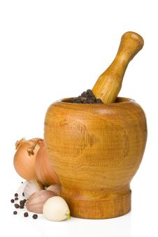 Garlic, Onion And Pepper In Mortar And Pestle Stock Image