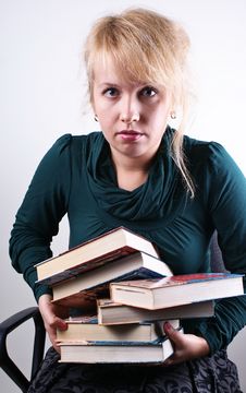 Girl Holds The Books Stock Image