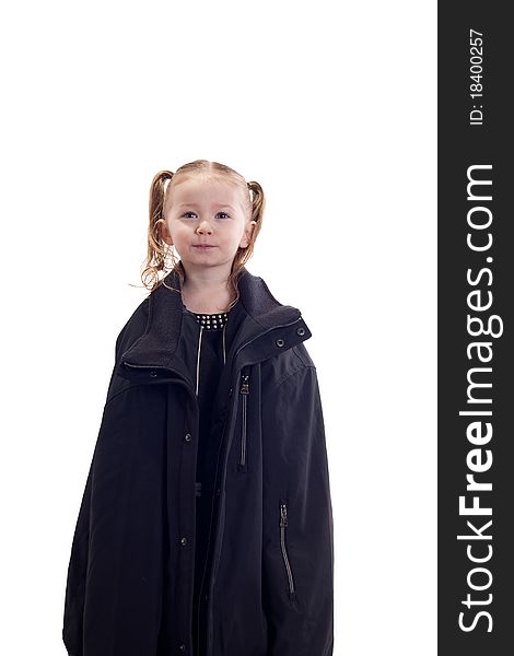 A cute kid with a funny facial expression and a cute pose! She is wearing a Black Coat. A cute kid with a funny facial expression and a cute pose! She is wearing a Black Coat.