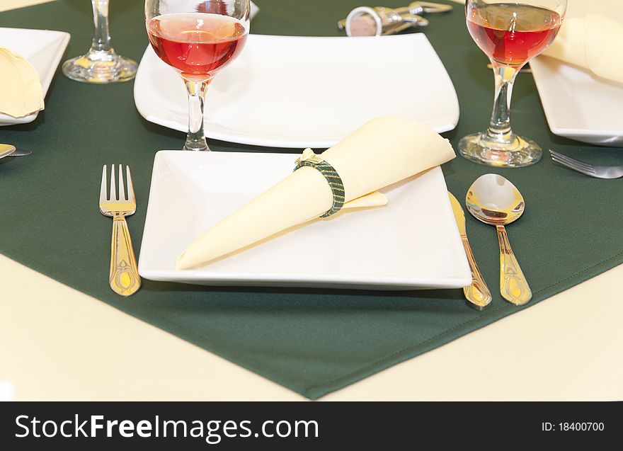 The served table with red wine at restaurant