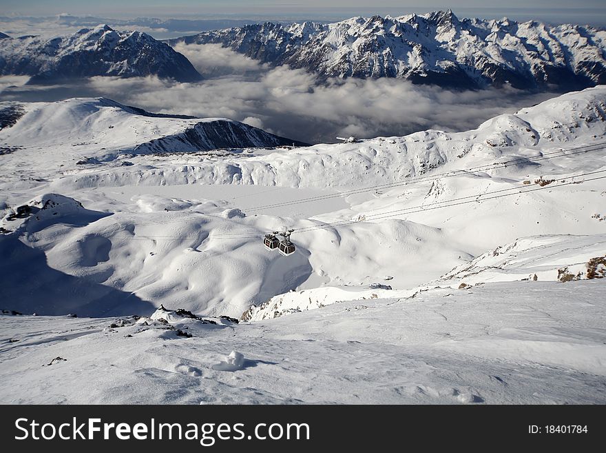 Winter panorama with ski gondola